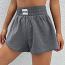 Shorts de pierna ancha con diseno de parche de letra