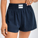 Shorts de pierna ancha con diseno de parche de letra