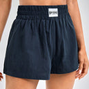 Shorts de pierna ancha con diseno de parche de letra