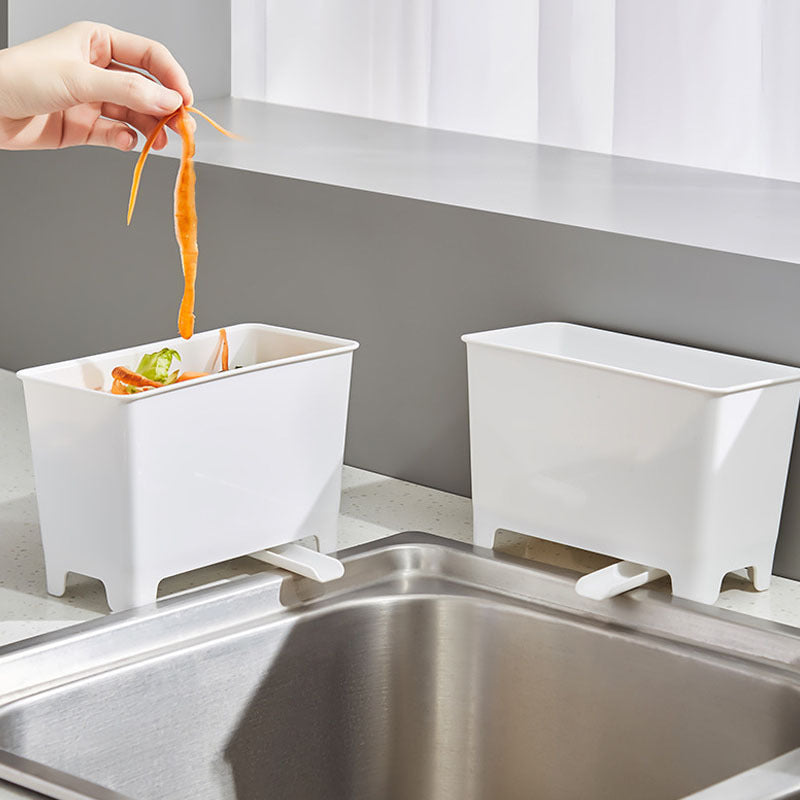 Un contenedor de basura de cocina no recargable con filtro - un recolector de basura de alimentos fácil de limpiar, adecuado para fregaderos, diseñado para ahorrar espacio en el hogar.