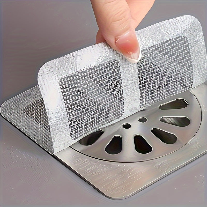50/100 Pegatinas autoadhesivas para capturar cabello, adecuadas para duchas, fregaderos de cocina y desagües de baño - Prevención de atascos, tapas de desagüe a prueba de insectos, filtros de cabello para desagües de ducha.