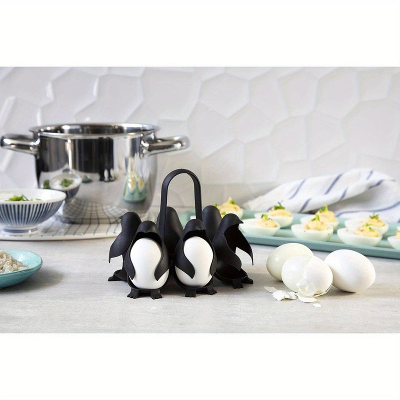 Soporte de huevo en forma de pingüino que cocina, almacena y sirve huevos, diseñado para hacer huevos duros o blandos, que puede acomodar 6 huevos para una cocción y refrigeración convenientes.