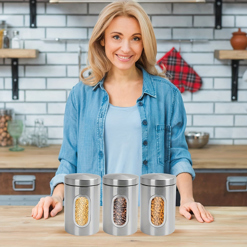 Tarros de Almacenamiento para Cocina, 3 Piezas en Acero Inoxidable con Ventana Transparente - Ideales para Café, Té y Granos - Organizador Redondo Reutilizable con Tapas Abatibles | Solución de Almacenaje Moderna | Utensilios de Cocina Duraderos