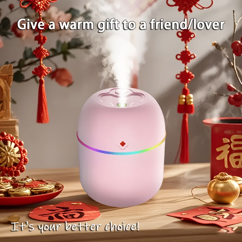 Un humidificador con alimentación USB adecuado para dormitorios, salas de estar, escritorios y automóviles, con luz ambiental, aerosol de aromaterapia y un diseño afortunado: portátil.