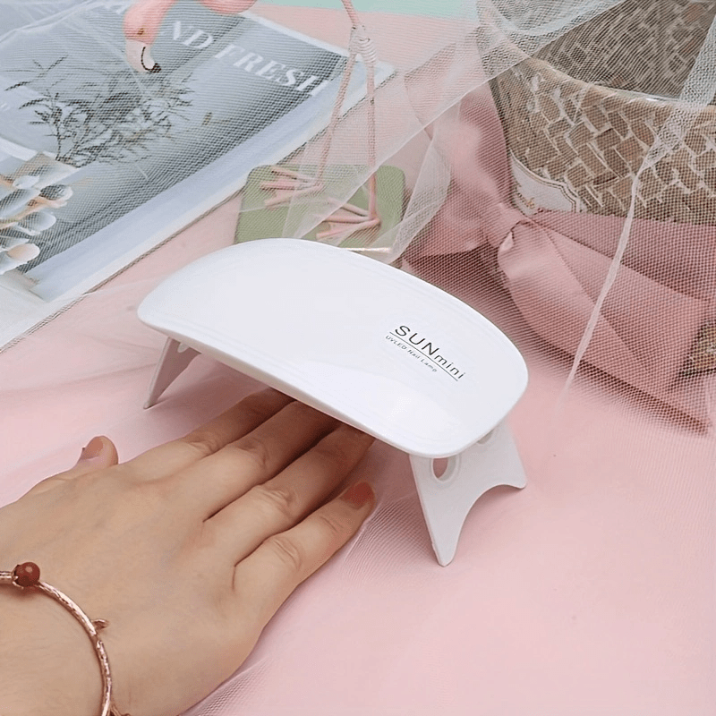 1 lámpara de uñas portátil mini con 6/LED de luz - Rosa y blanca, alimentada por USB, diseño plegable, adecuada para pulir y secar gel - Ideal para el cuidado de manos, pies y uñas