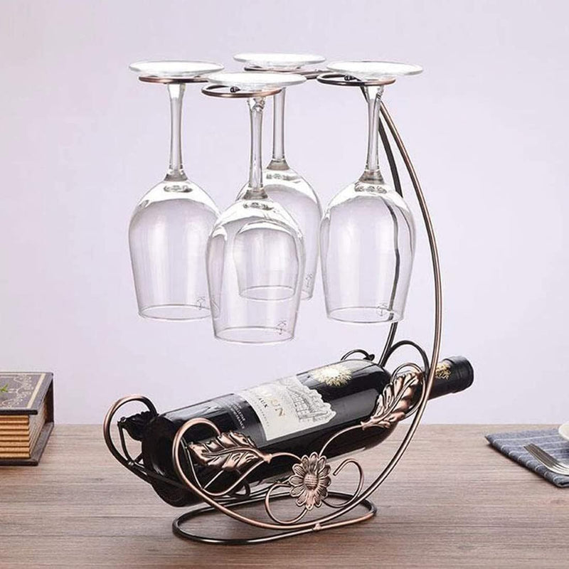 Soporte de botella de vino vintage y vaso con diseño metálico ornamentado - Alberga 1 botella y 4 vasos con tallo, ideal para decoración del hogar, fiestas y regalos de vacaciones, decoración de botella de vino.