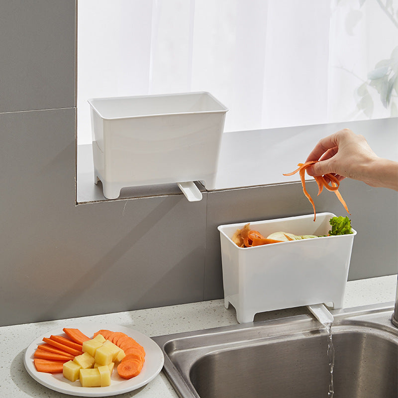 Un contenedor de basura de cocina no recargable con filtro - un recolector de basura de alimentos fácil de limpiar, adecuado para fregaderos, diseñado para ahorrar espacio en el hogar.