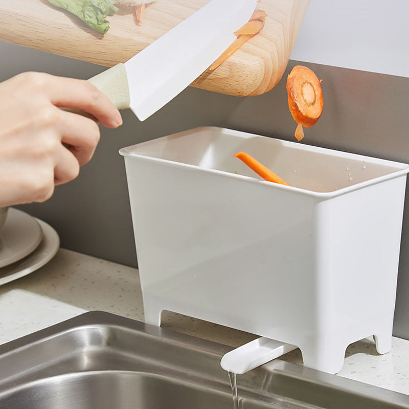 Un contenedor de basura de cocina no recargable con filtro - un recolector de basura de alimentos fácil de limpiar, adecuado para fregaderos, diseñado para ahorrar espacio en el hogar.