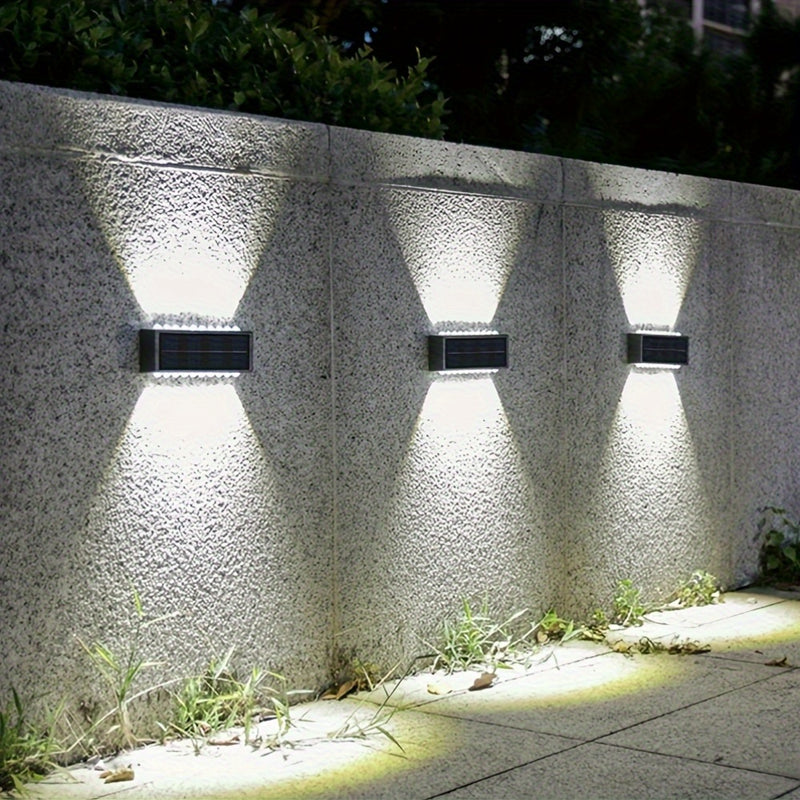 4 piezas de luces solares de 16 LED para exteriores, para decorar patios y paredes, IP44, fácil instalación, plástico duradero, iluminación de senderos exteriores para jardines.