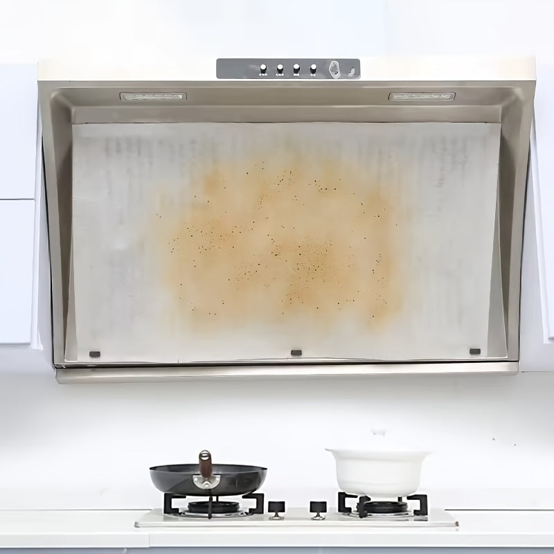 Juego de filtros de alta rendimiento para campanas de cocina, diseñados para absorber eficazmente la grasa y prevenir el humo, compatibles y duraderos con protección adhesiva.