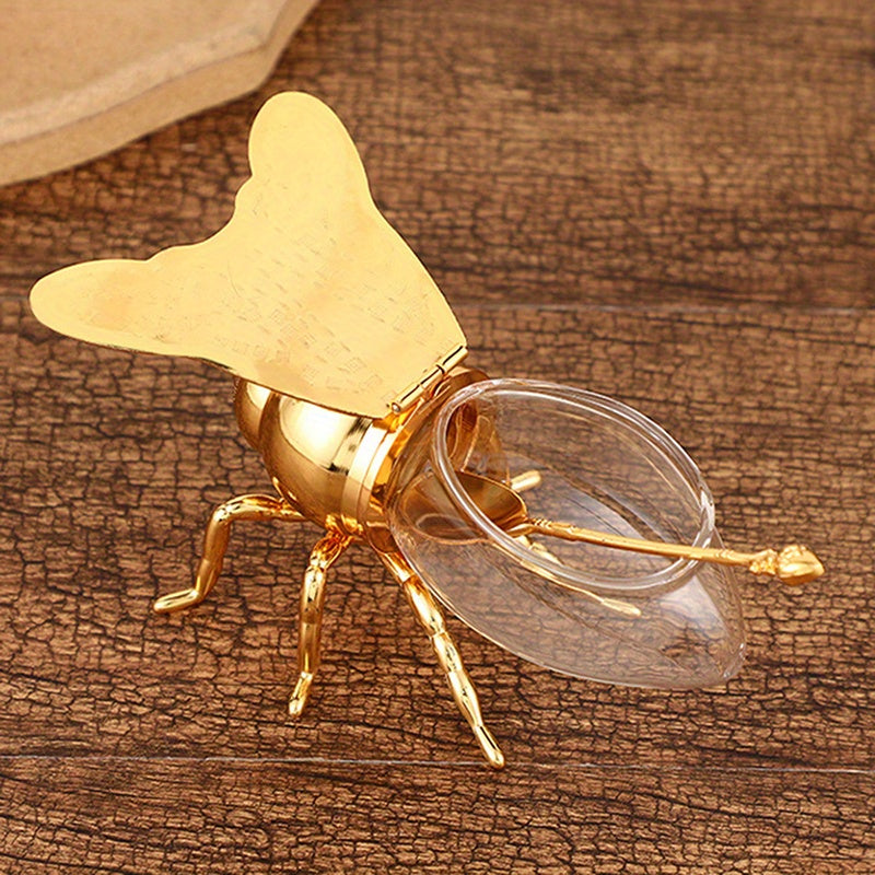 Tarro de Miel con Forma de Abeja Lujoso - Frasco Metálico Dorado y Vidrio con Tapa Articulada y Cuchara, Almacenamiento Decorativo para Miel, Especias, Azúcar, Té - Estilo Vintage para Mesa, 14x9.6x8 cm