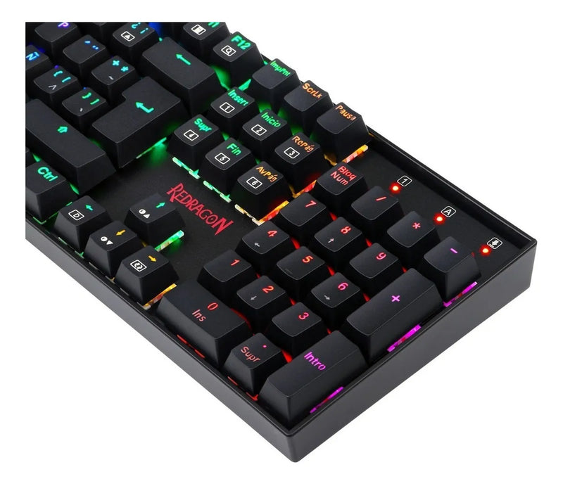 Teclado gamer Redragon Mitra QWERTY Outemu Blue español latinoamérica color negro con luz RGB