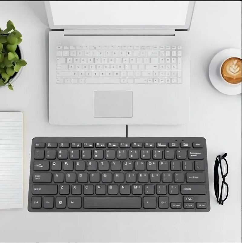 Teclado Alámbrico Aaa-1000 Compatible Con Windows Y Mac Color del teclado Negro