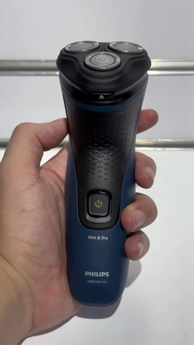 Afeitadora Philips Shaver Serie 1000, Húmedo y Seco Máquina de Afeitar, 27 Cuchillas Auto Afilables PowerCut, Cabezales Flotantes 3D, Azul Malibu, Modelo S1151/00