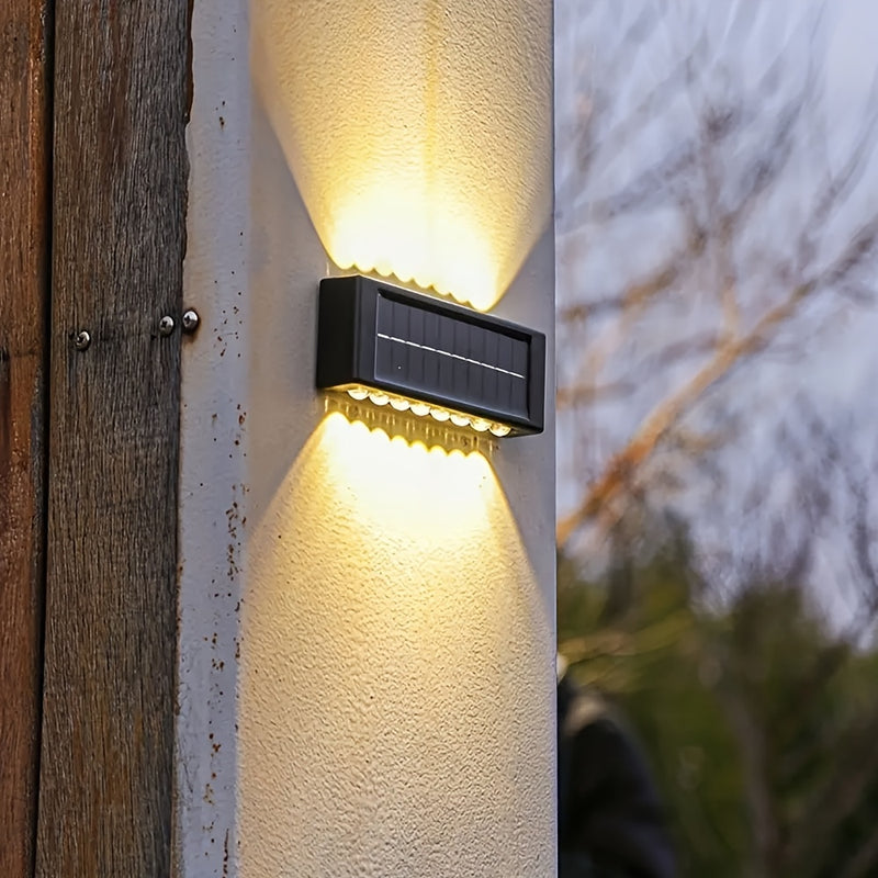 4 piezas de luces solares de 16 LED para exteriores, para decorar patios y paredes, IP44, fácil instalación, plástico duradero, iluminación de senderos exteriores para jardines.