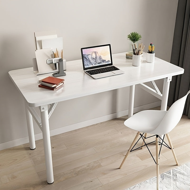 Una mesa plegable rectangular para alquilar, adecuada para comer, estudiar o usar una computadora, sin necesidad de instalación.
