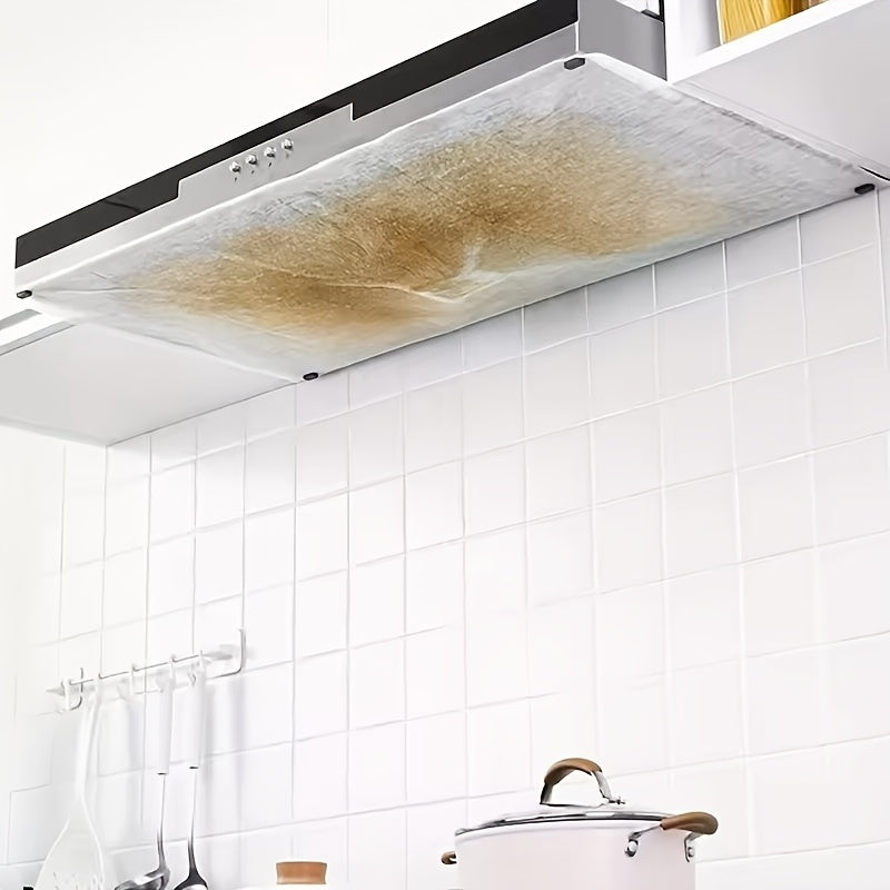 Juego de filtros de alta rendimiento para campanas de cocina, diseñados para absorber eficazmente la grasa y prevenir el humo, compatibles y duraderos con protección adhesiva.