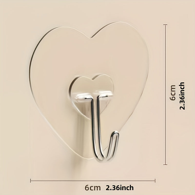 10 ganchos adhesivos grandes y resistentes, copas de succión transparentes sin taladro, soportes para pared en forma de corazón reforzados para almacenamiento en cocina y baño, fácil instalación, estilo casual, ganchos utilitarios