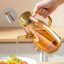 Dispensador de Aceite de Vidrio de 20oz a Prueba de Fugas con Tapa y Mango de Acero - Libre de BPA, Perfecto para Aceite de Oliva, Vinagre, Condimentos - Ideal para Cocina, BBQ, Camping, Picnics