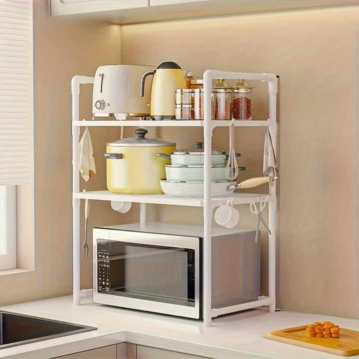 Un estante de almacenamiento de cocina con asas, ideal para hornos microondas y tostadores, incluye ganchos laterales para toallas, resistente y duradero, perfecto para uso doméstico.