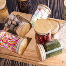 Un juego de 12 frascos de vidrio para especias, cada uno con una capacidad de 250 ml, con tapas y etiquetas de bambú, adecuado para almacenar especias, sellar alimentos y organizar condimentos de cocina.