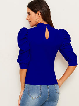 Camisa de manga farol exagerada