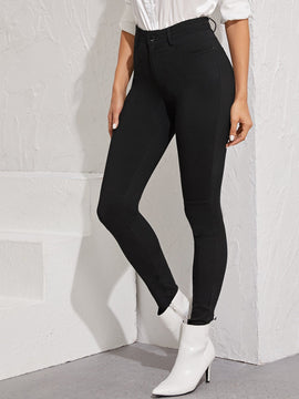 Essnce Jeggings ajustados con boton con lavado negro