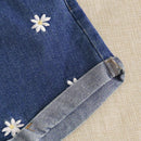 Shorts en mezclilla con bordado floral
