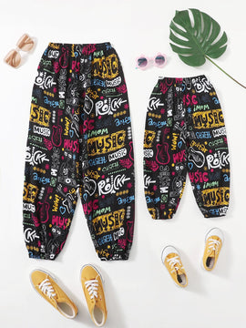 EZwear Pantalones conicos con estampado de letra y dibujo