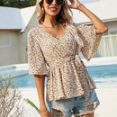 Unity Top peplum floral con cinturon de cuello cruzado