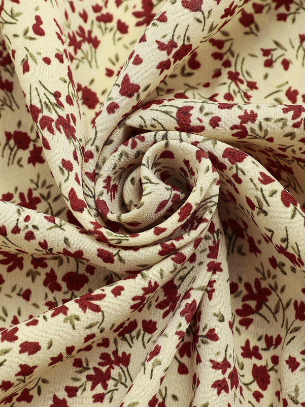 Unity Top peplum floral con cinturon de cuello cruzado