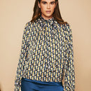 Top de cuello con cordon con estampado