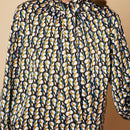 Top de cuello con cordon con estampado