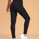 Essnce Pantalones ajustados rasgados de alta elasticidad