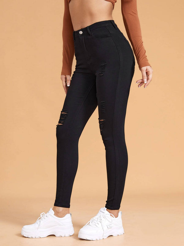 Essnce Pantalones ajustados rasgados de alta elasticidad