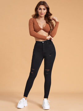 Essnce Pantalones ajustados rasgados de alta elasticidad