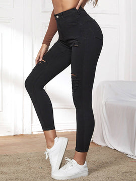 Essnce Pantalones ajustados rasgados de extremo alto