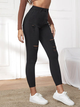 Essnce Pantalones ajustados rasgados de extremo alto