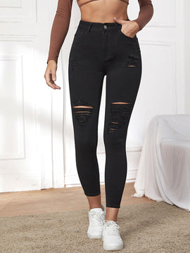 Essnce Pantalones ajustados rasgados de extremo alto
