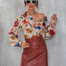 Clasi Camisa con estampado floral con boton delantero
