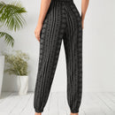 EMERY ROSE Pantalones zanahoria con estampado de paisley