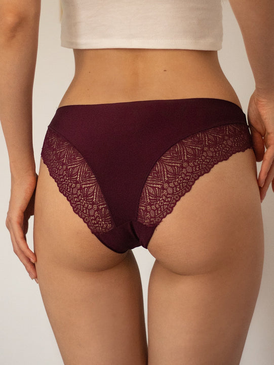 Tangas unicolor con encaje en contraste