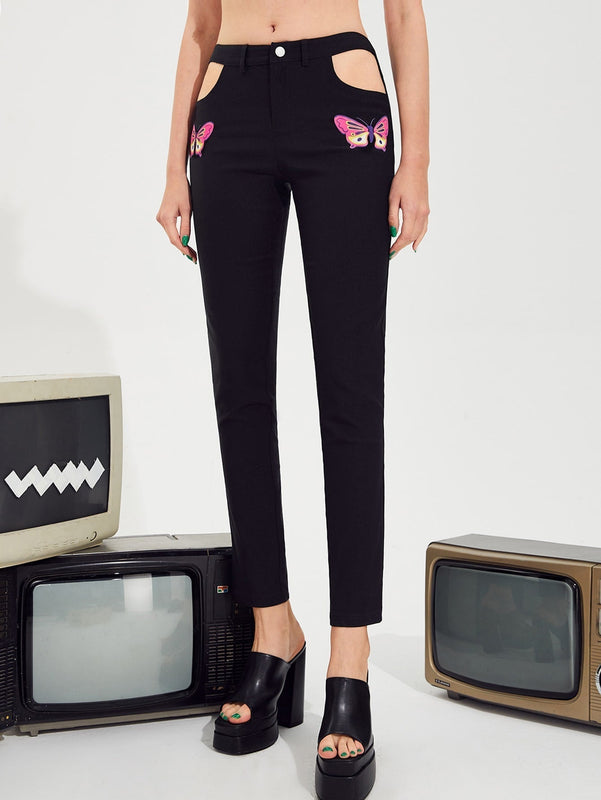 Pantalones con estampado de mariposa con abertura