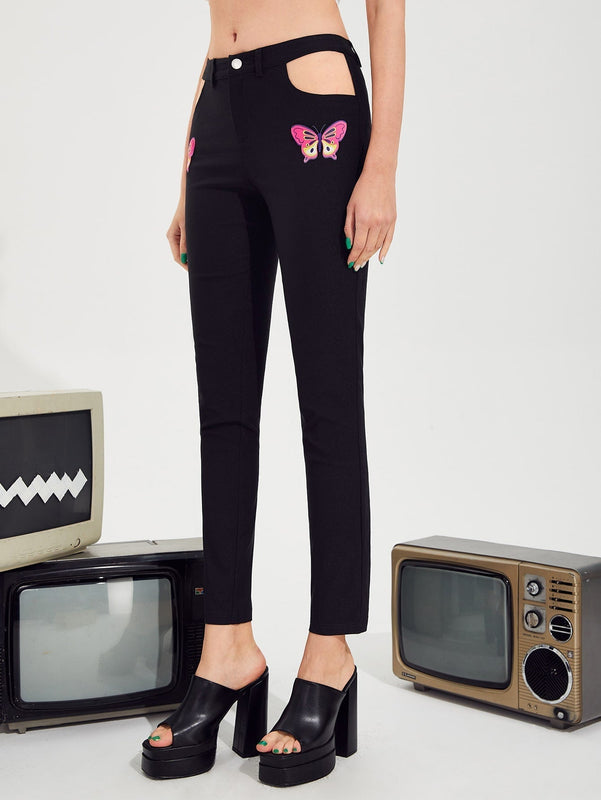 Pantalones con estampado de mariposa con abertura