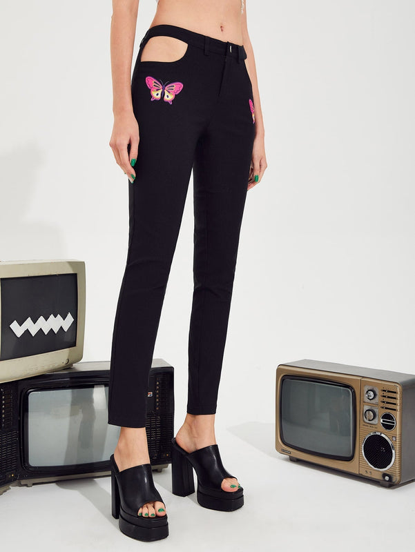 Pantalones con estampado de mariposa con abertura