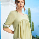 Unity Blusa peplum de manga farol con encaje en contraste