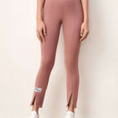 Mulvari Pantalones con diseno de parche de letra bajo con abertura