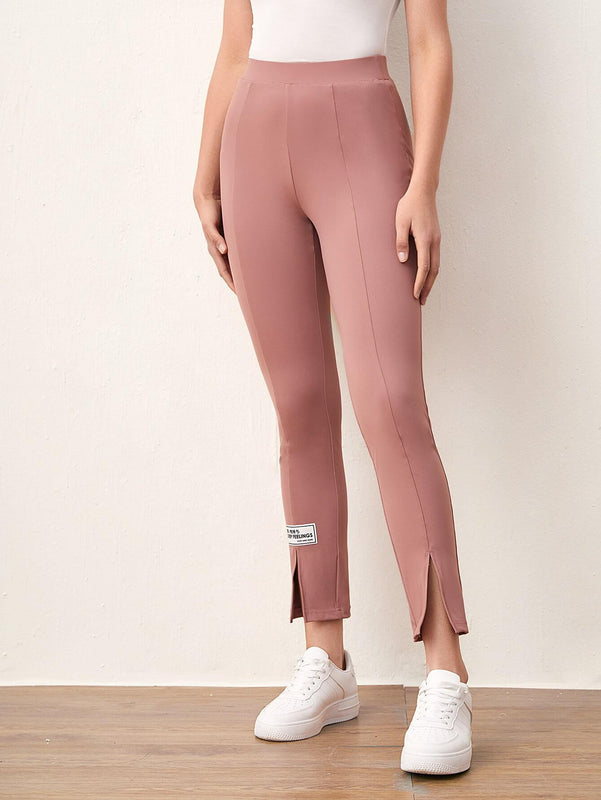 Mulvari Pantalones con diseno de parche de letra bajo con abertura