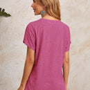 Camiseta escote V de manga murcielago unicolor