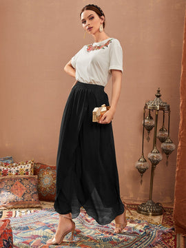 Pantalones de cintura elastica bajo tulipan